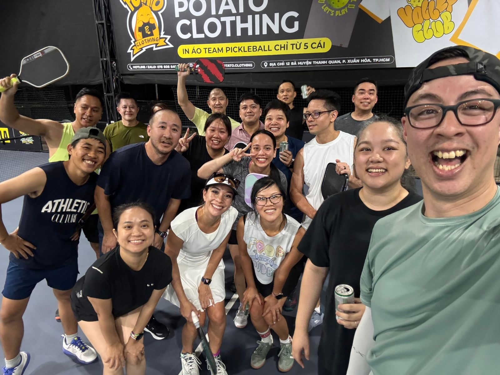 Friends smiling together after a local pickleball social